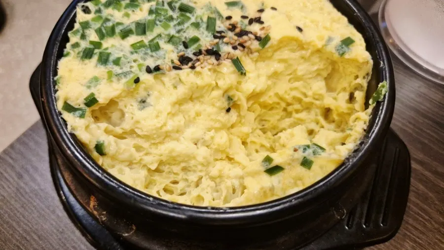 Cross-section of egg custard with added chives