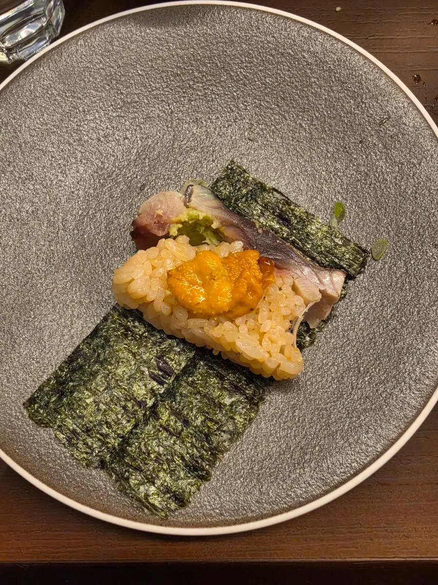 A plate of mackerel bar sushi piled thick
