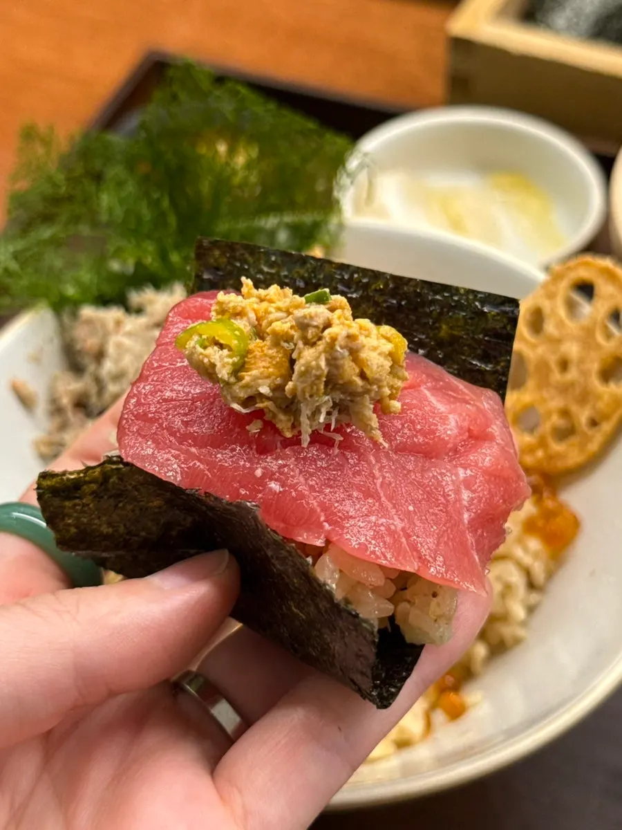 Uni and ankimo placed on top of tuna