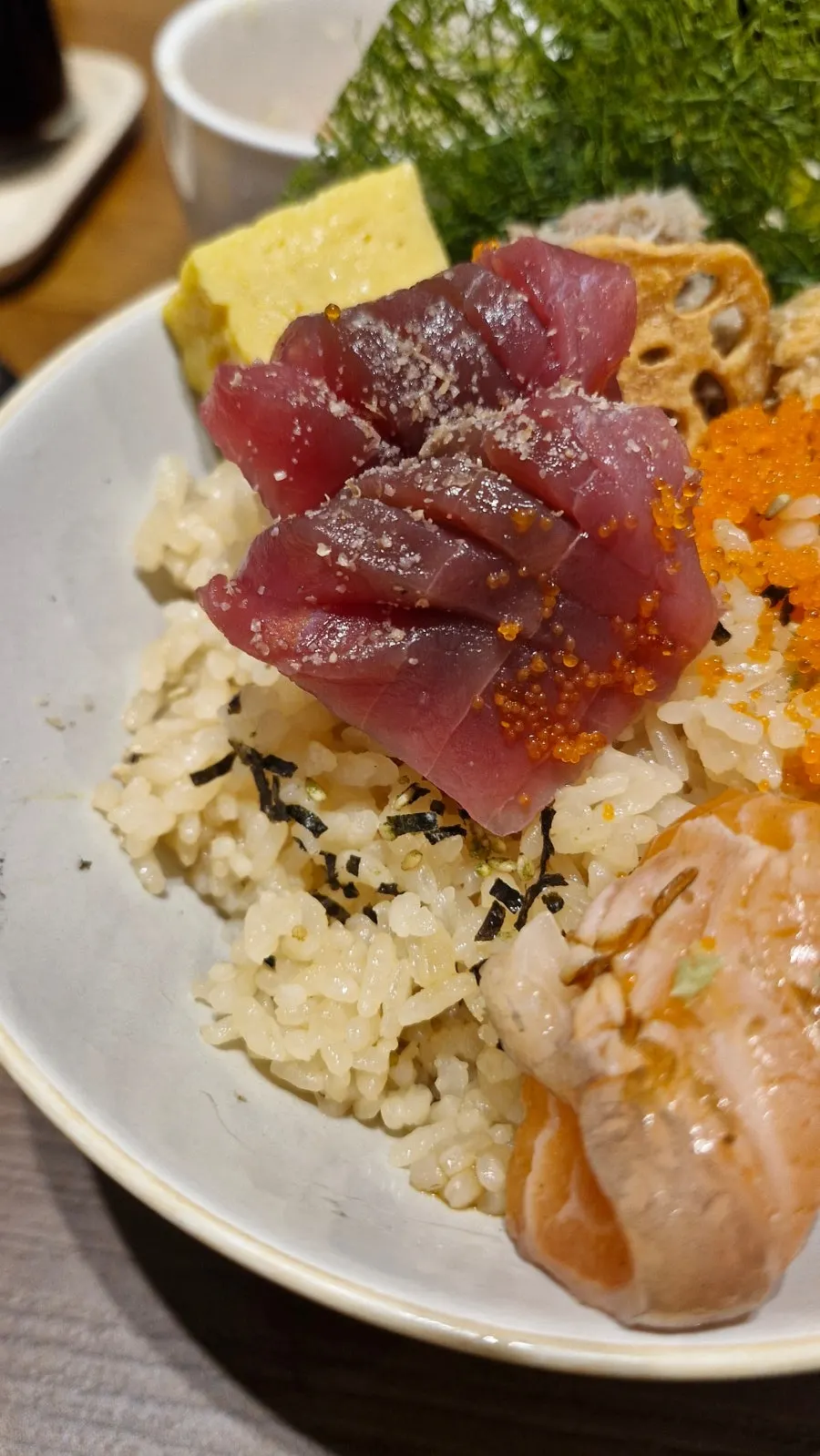 Seasoned sushi rice visible inside the rice bowl