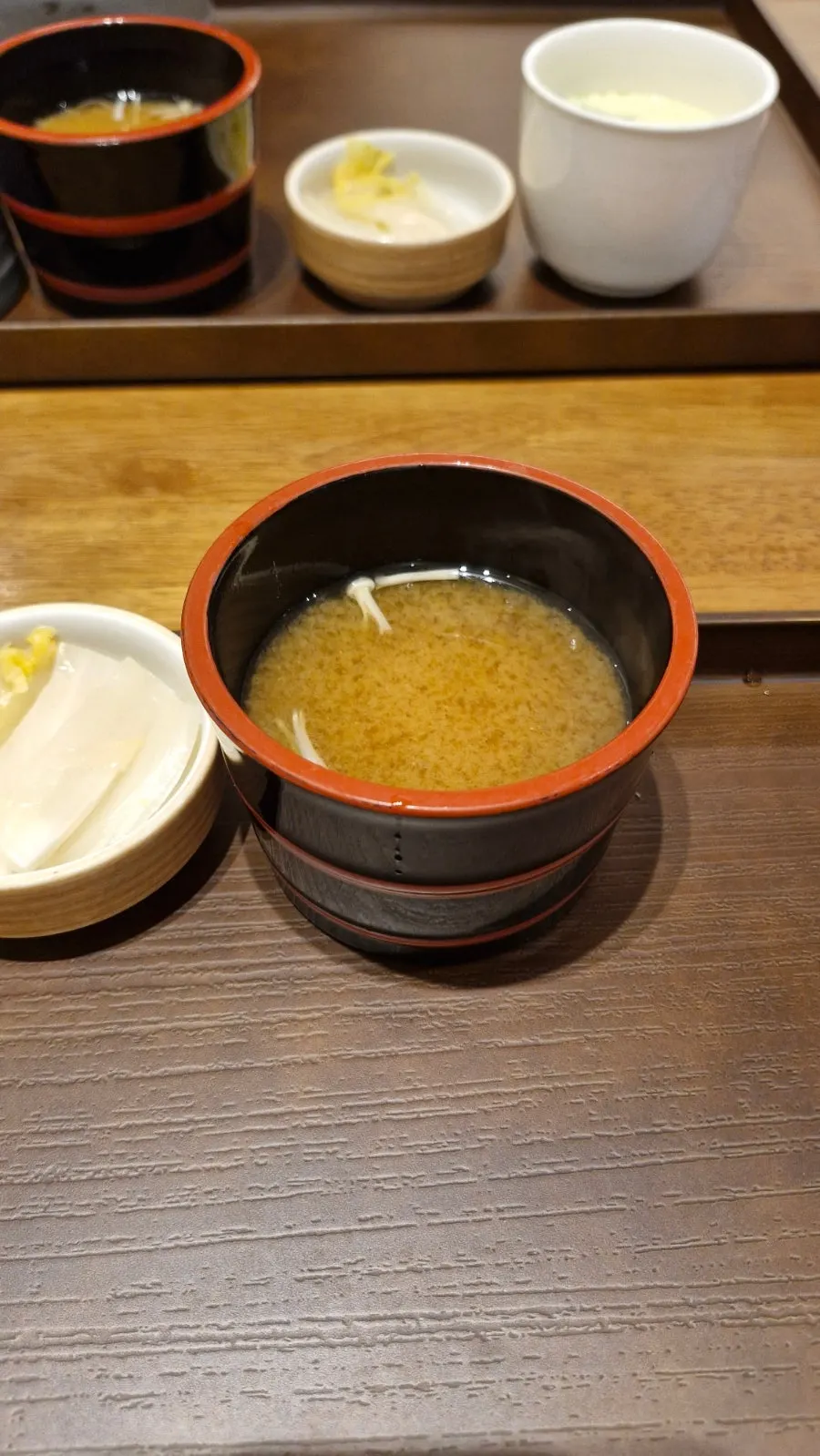 Miso soup served alongside the meal
