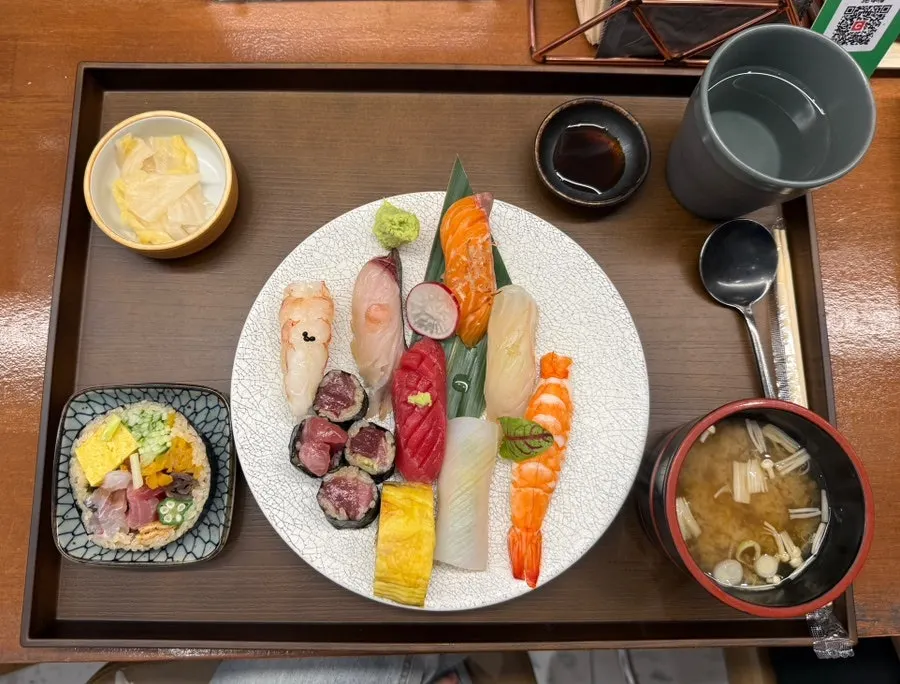 Plate of sushi with salmon, shrimp, and tuna