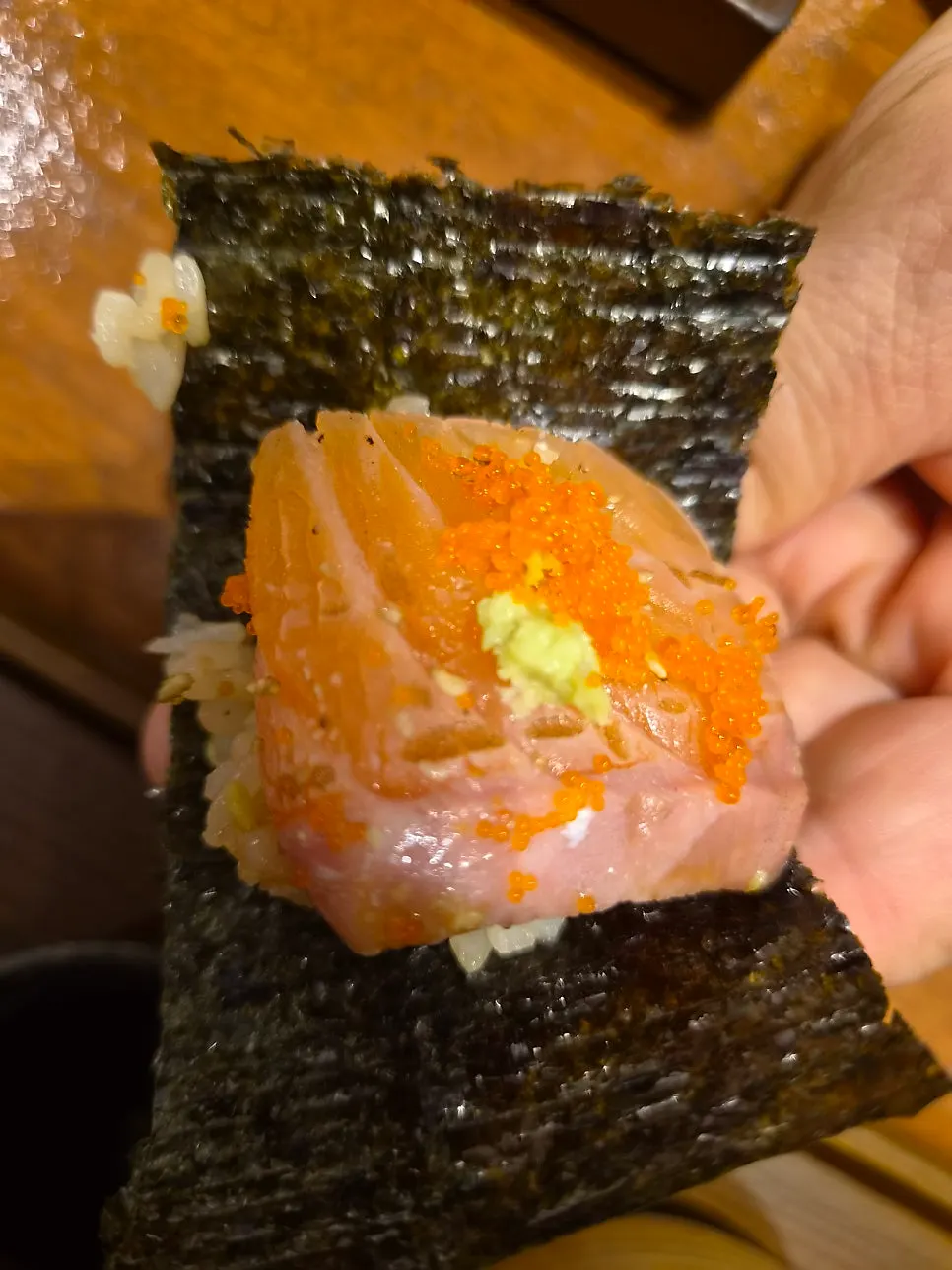 Rice and seafood piled on seaweed for a kaisendon bite