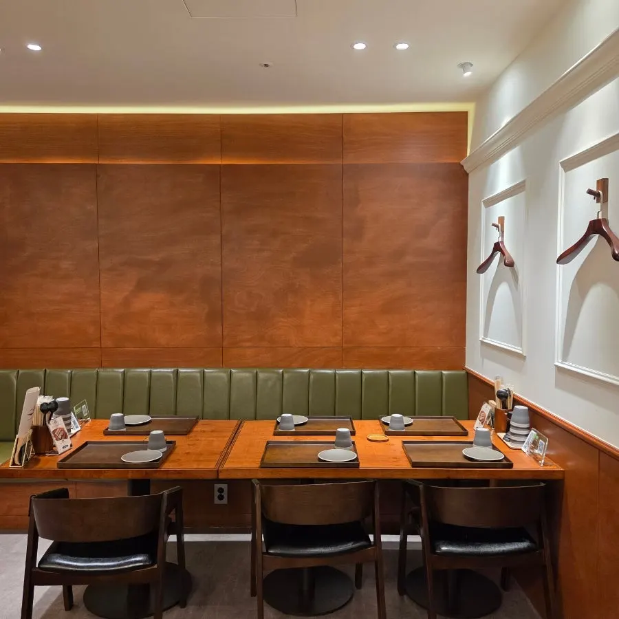 Interior of Ilpum Gangnam Branch with wood-tone decor