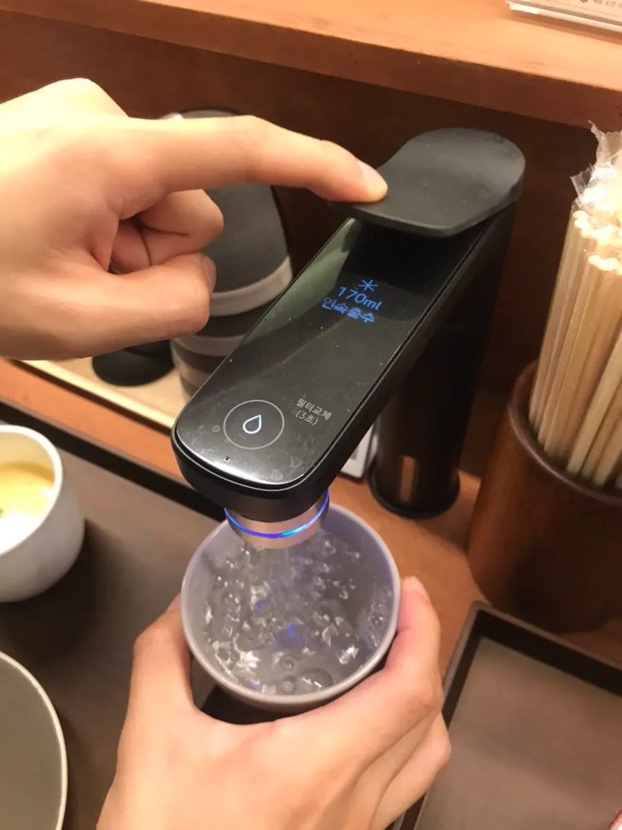 Water purifier and table setting at each seat
