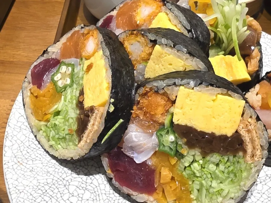 Cross-section of futomaki with salmon and rolled egg