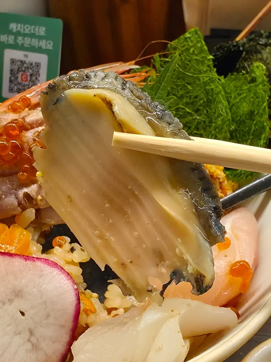 Kaisendon topped with chewy abalone