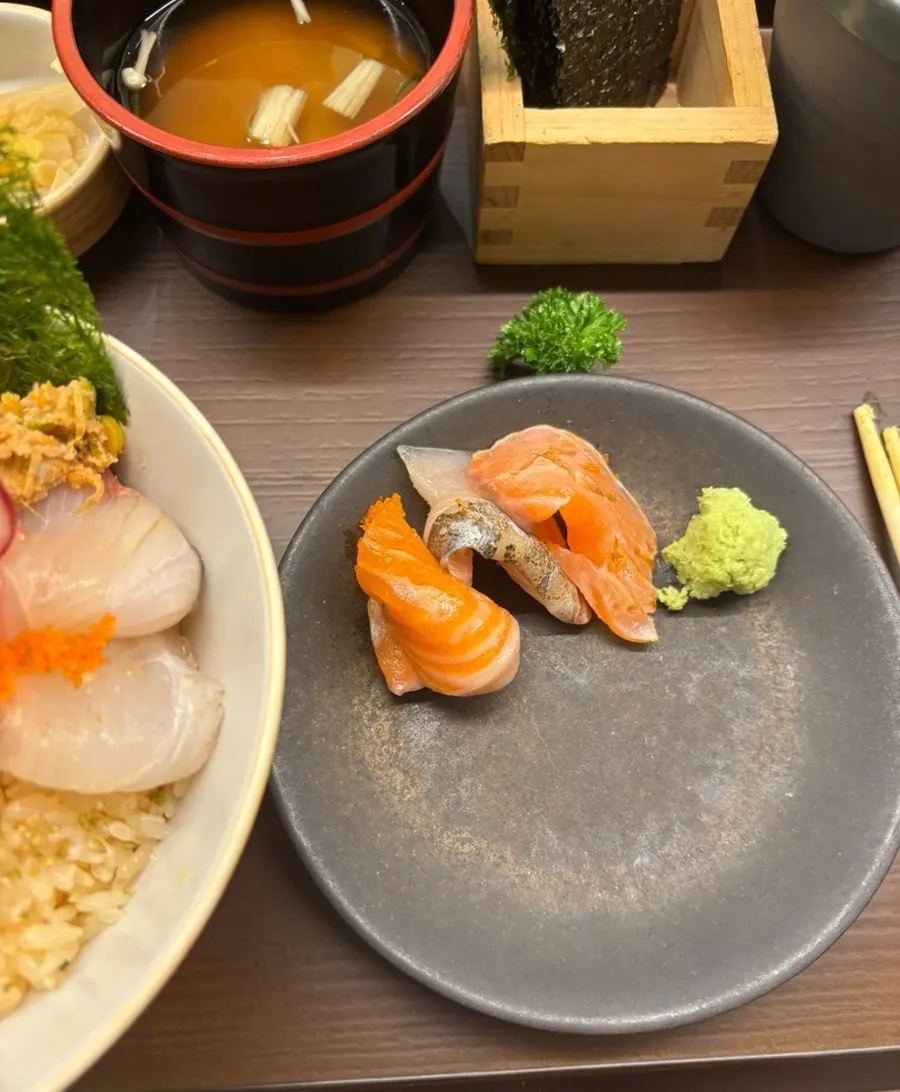 Sashimi set aside on a small plate
