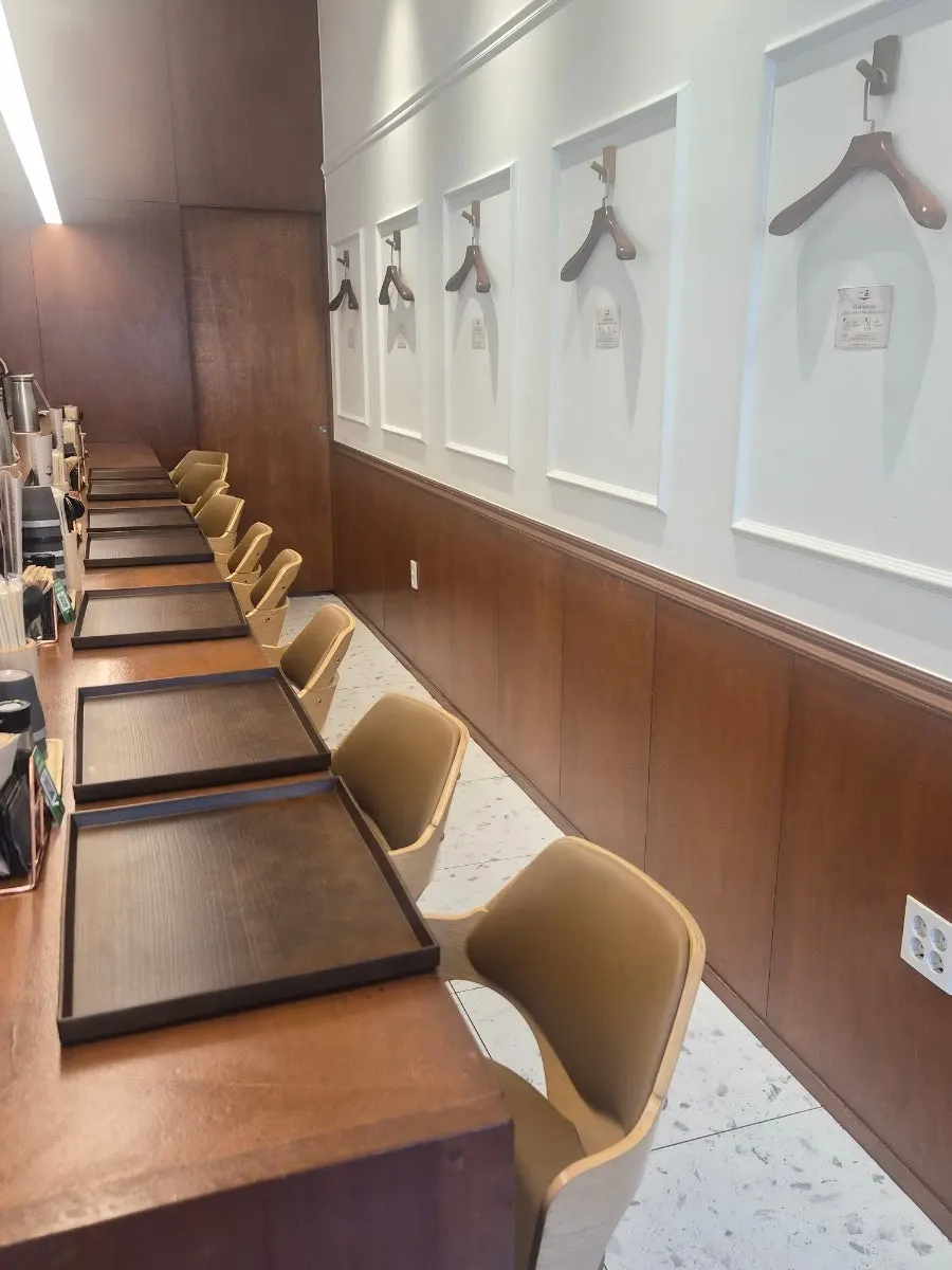 Dachi counter seats at Ilpum Magok facing the open kitchen