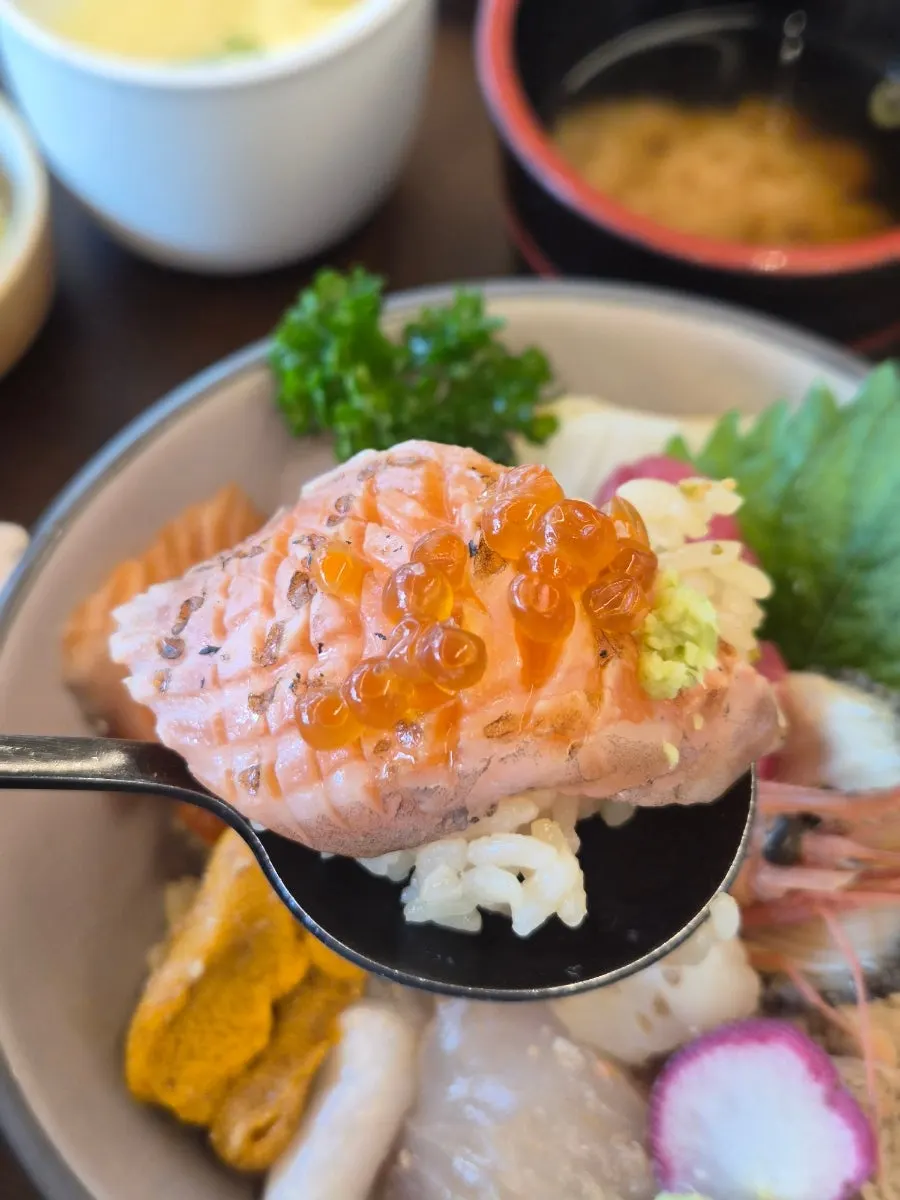 A thick-cut piece of sashimi from the kaisendon