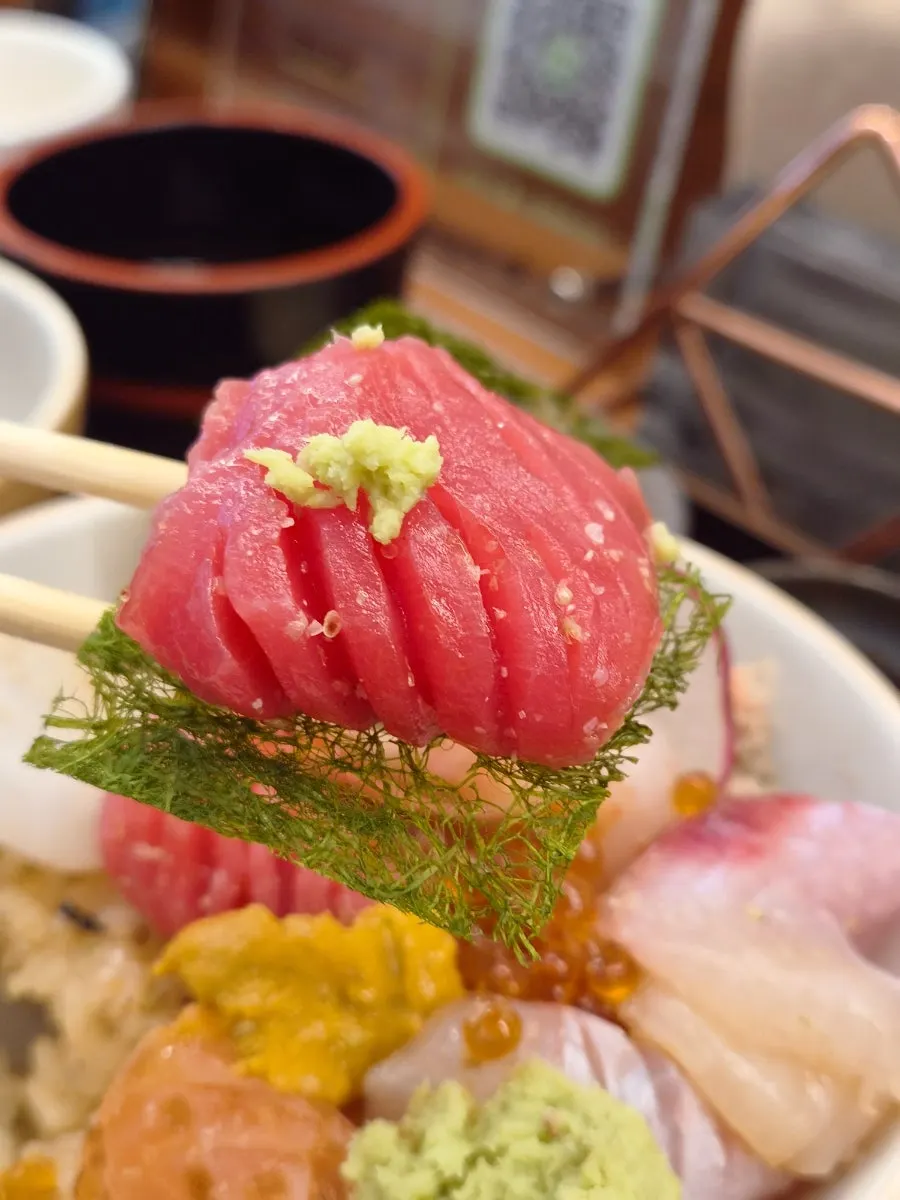 Eating the premium kaisendon with rice