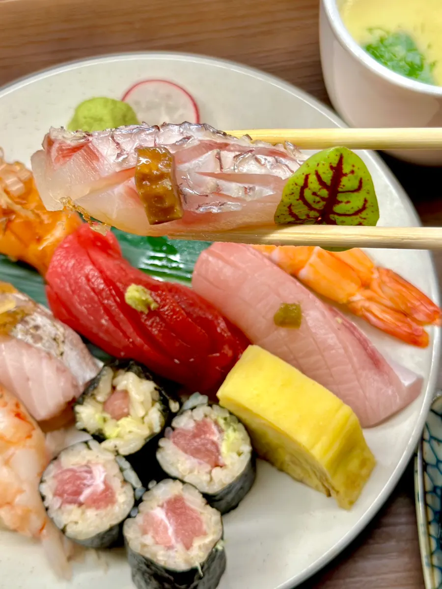 Nigiri from today's sushi topped with garnishes