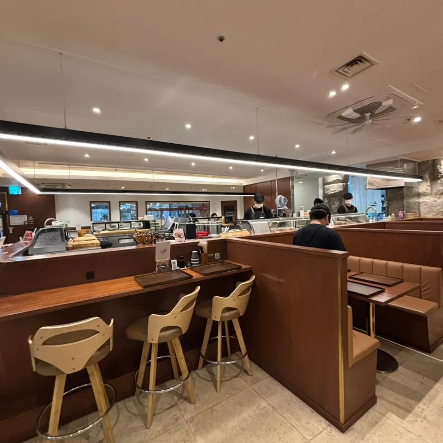 Restaurant seating with lunchtime guests