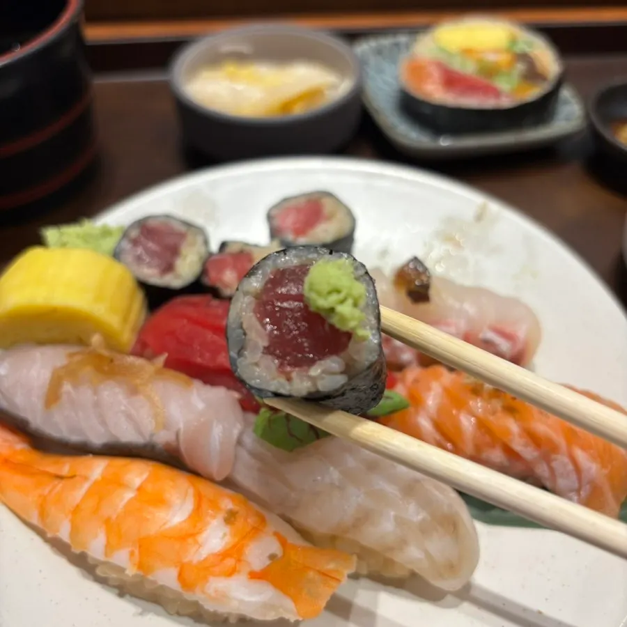 Close-up of sushi with shrimp, salmon, and tuna