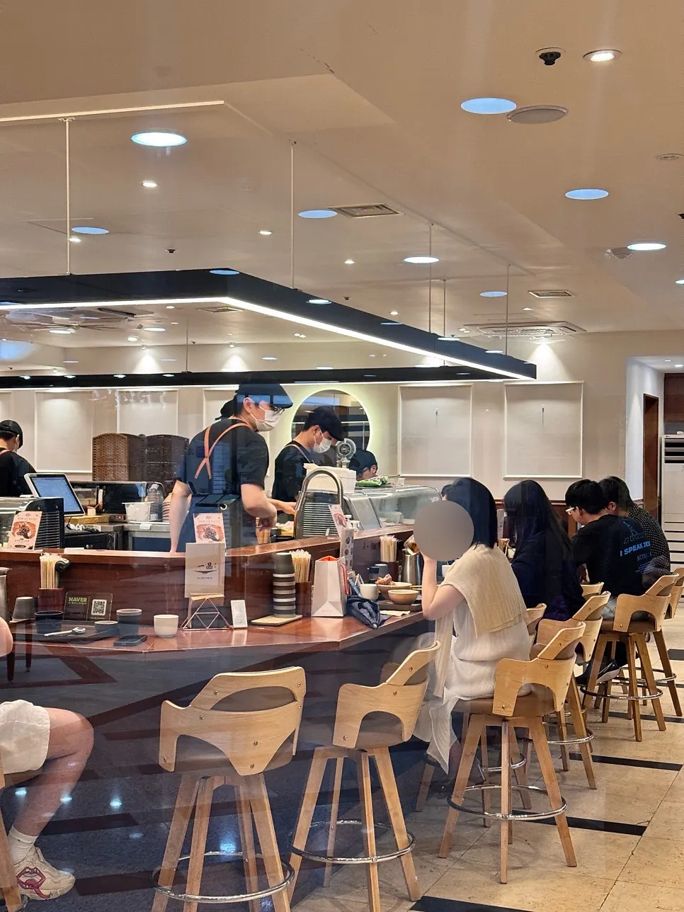 Inside the open kitchen, exposed on three sides