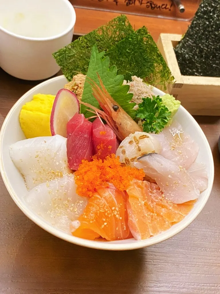 Sliced eel with rolled omelet layered underneath