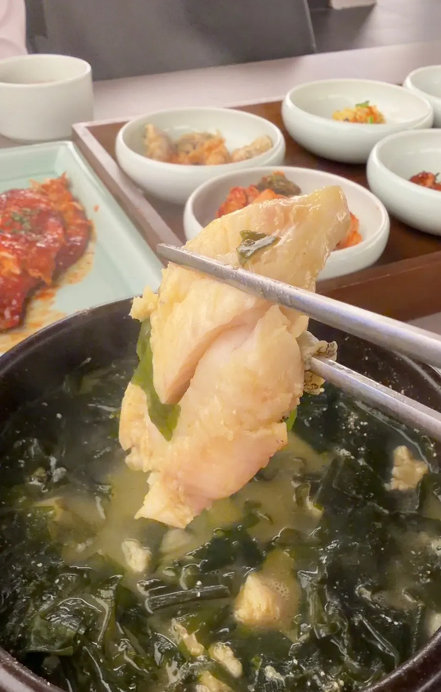 Seaweed soup with thick pieces of boneless flounder