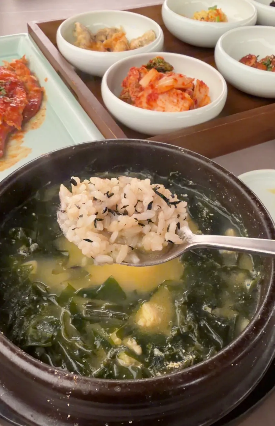 Meal of seaweed soup served with kimchi