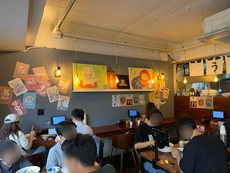 Widely spaced bar seats at Gyedan Ramen