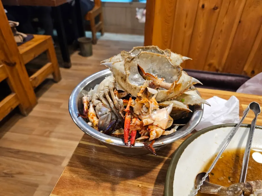 Container full of crab shells after the meal
