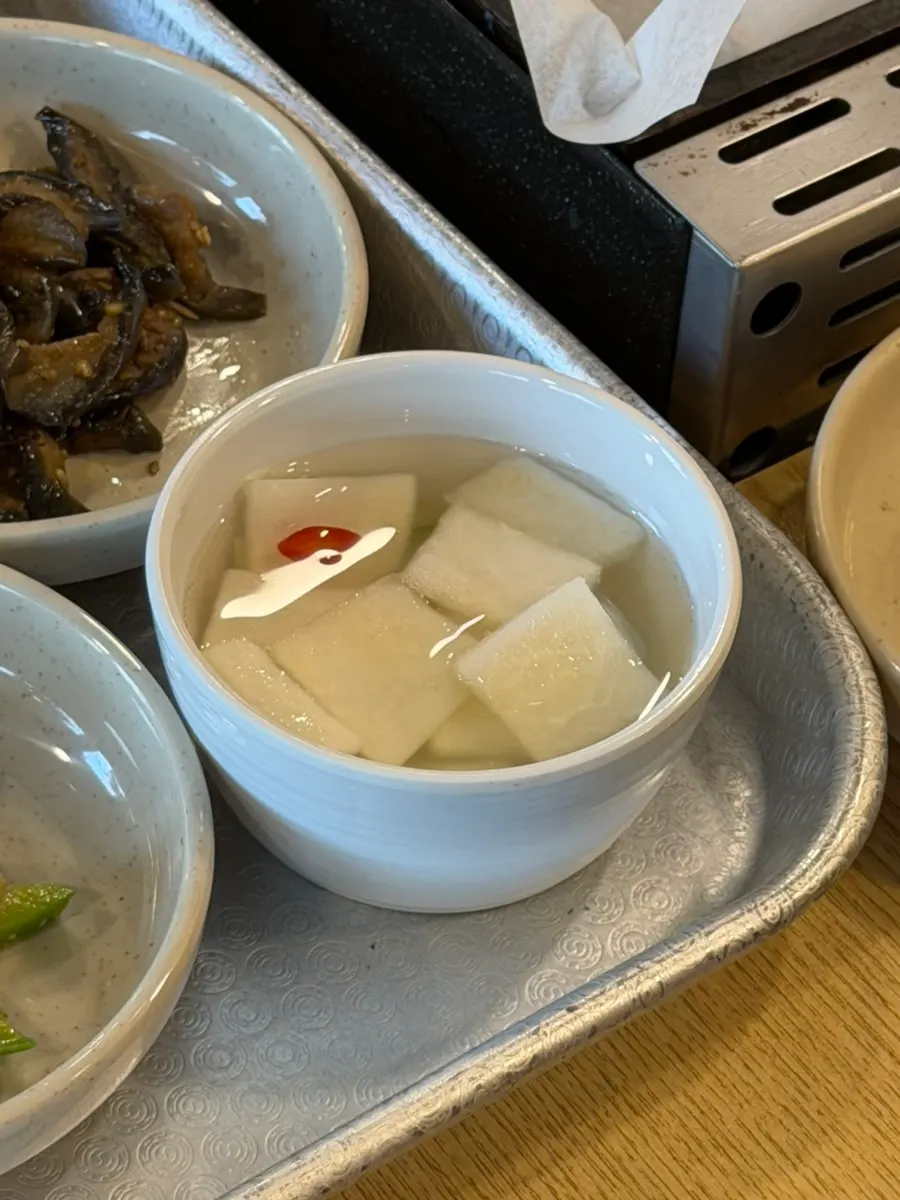 Duck bulgogi side dishes set on the table