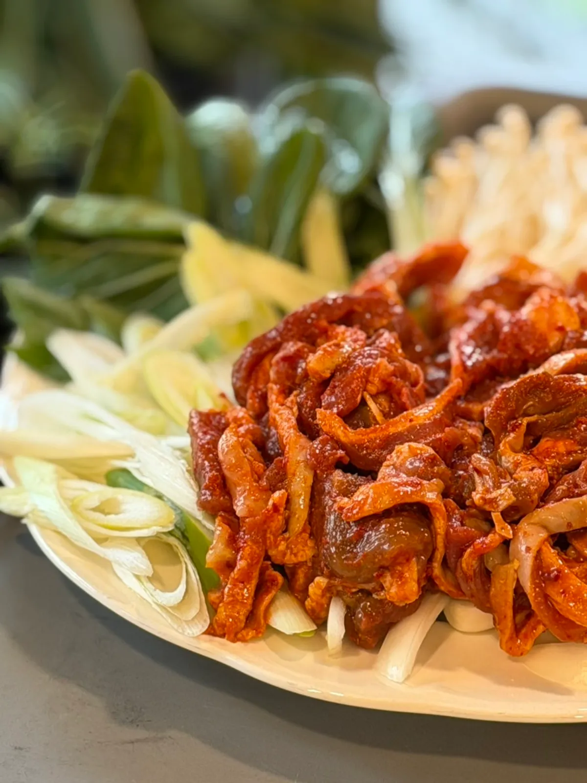 Half portion of marinated duck bulgogi with vegetables