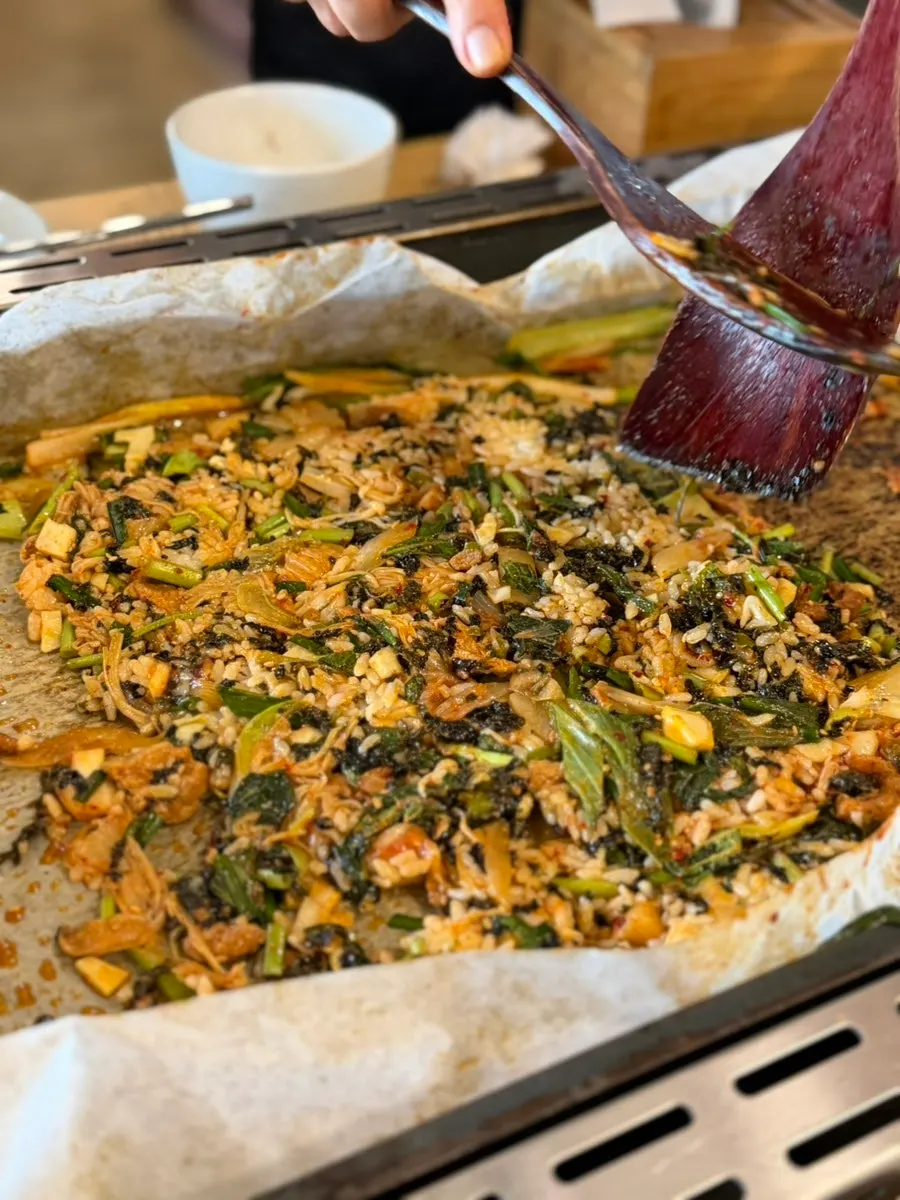 Staff making the finishing fried rice