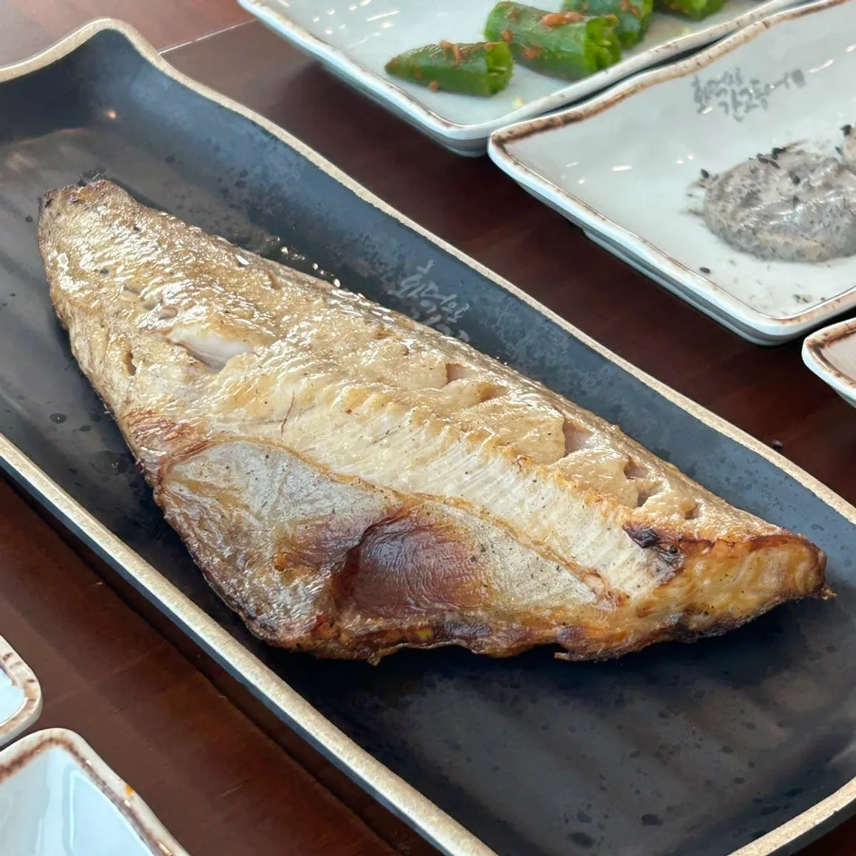 Grilled Atka mackerel and pot rice spread at Hwadegeuro Gan Godeungeo Siksa Branch
