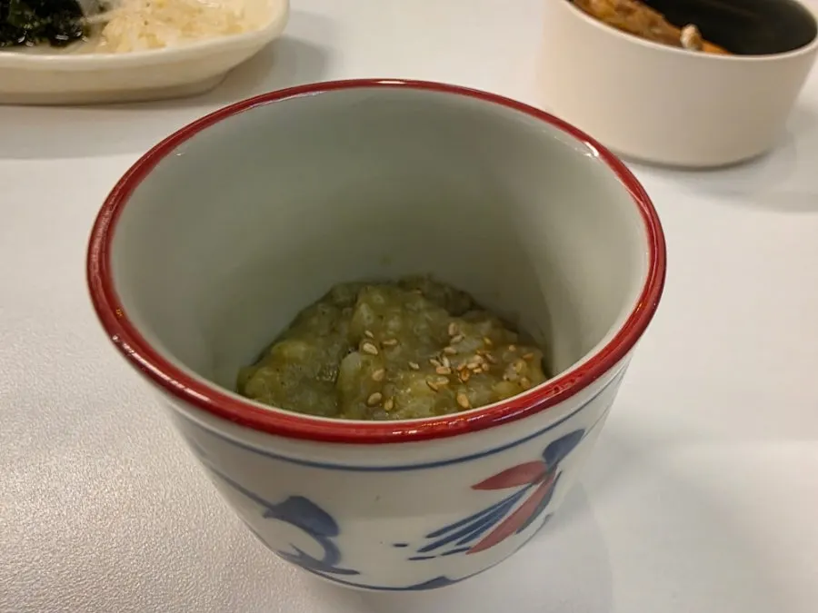 Bowl of seasonal porridge served before the sushi