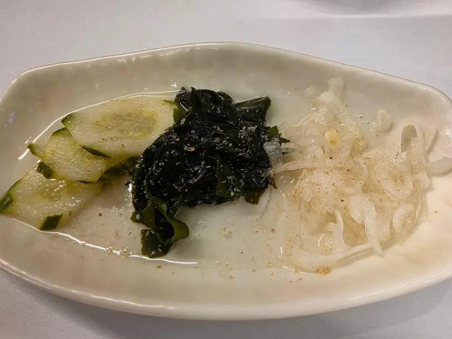 Table set with side dishes before the meal begins