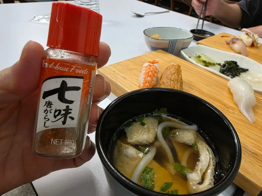 Udon broth sprinkled with shichimi