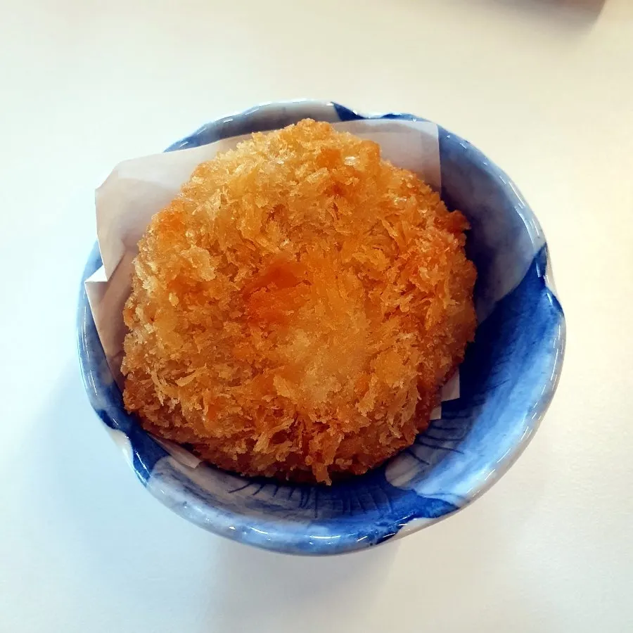 Close-up of generously sized aged sushi neta