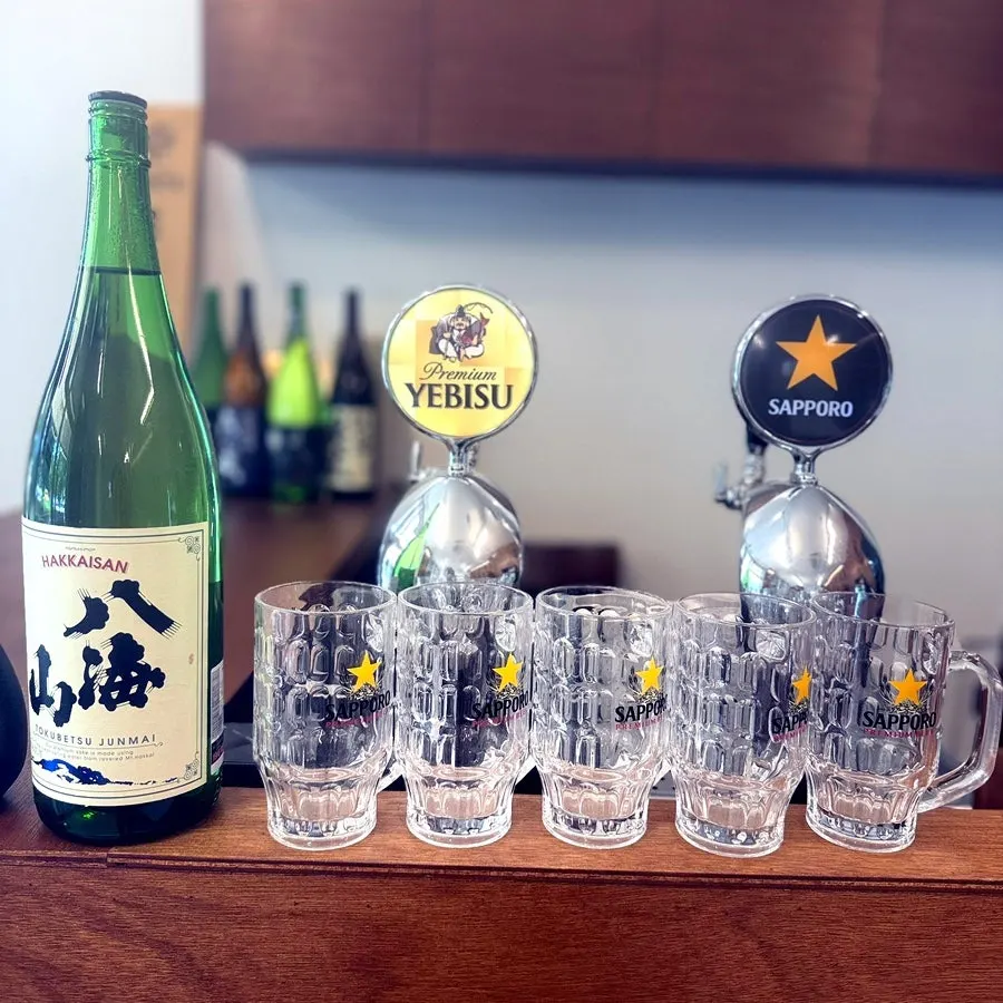 Ebisu and Sapporo draft beer taps