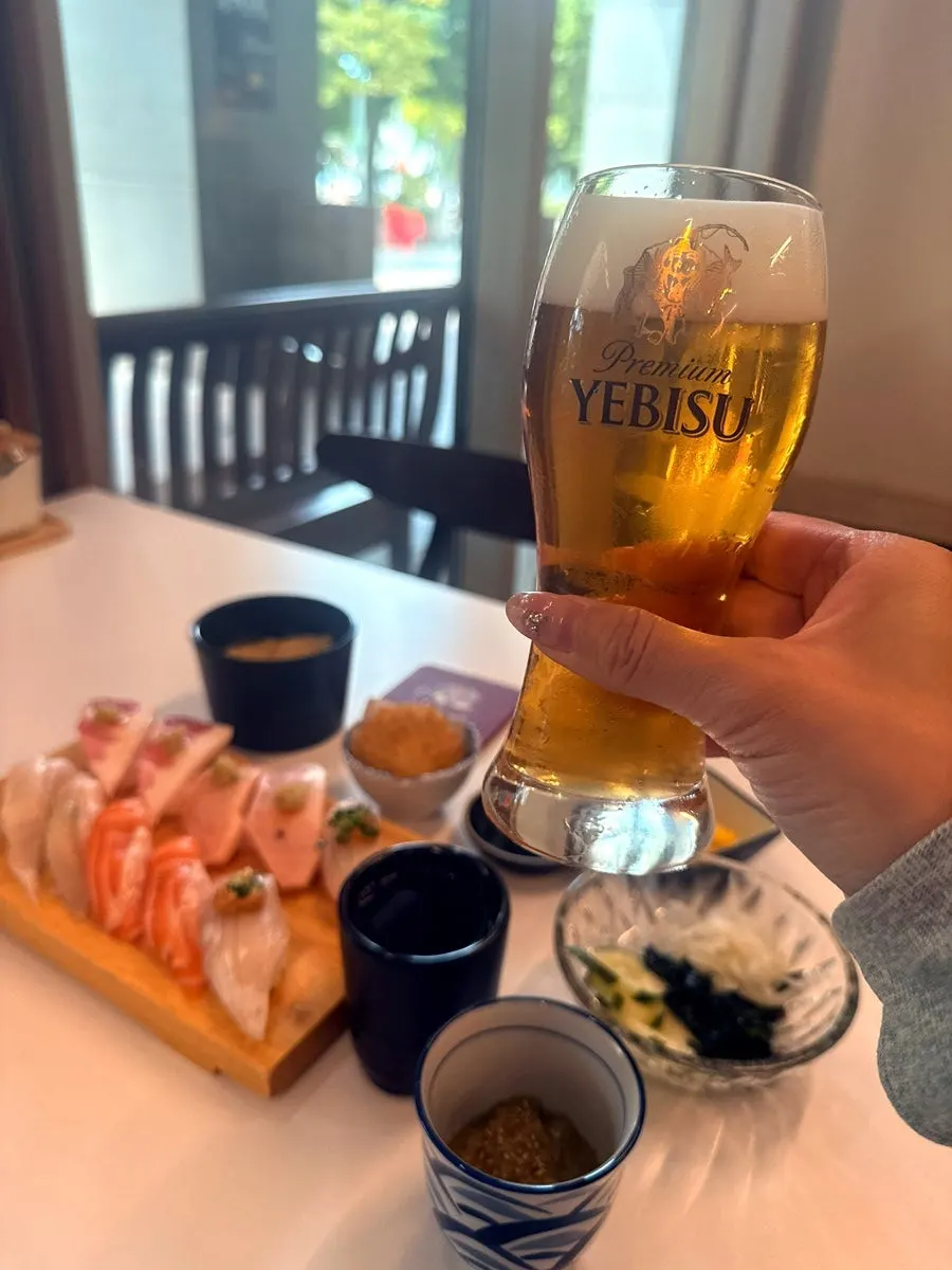 A refreshingly poured glass of Ebisu draft beer