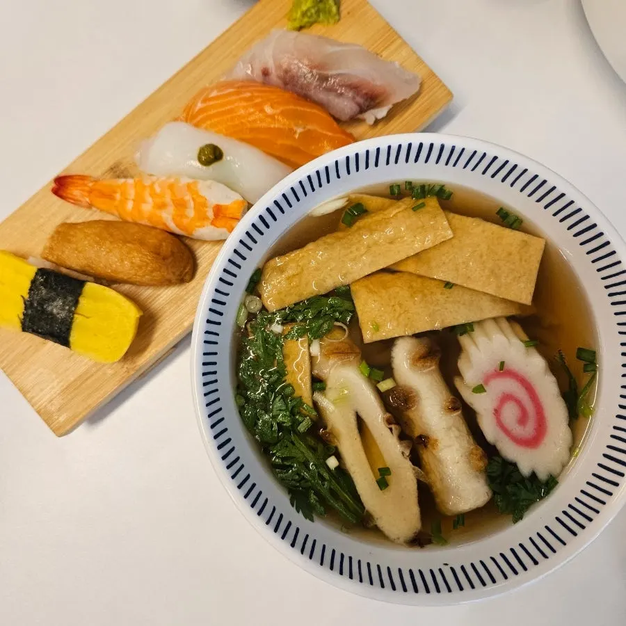 Lunch set with 6 pieces of sushi and half udon