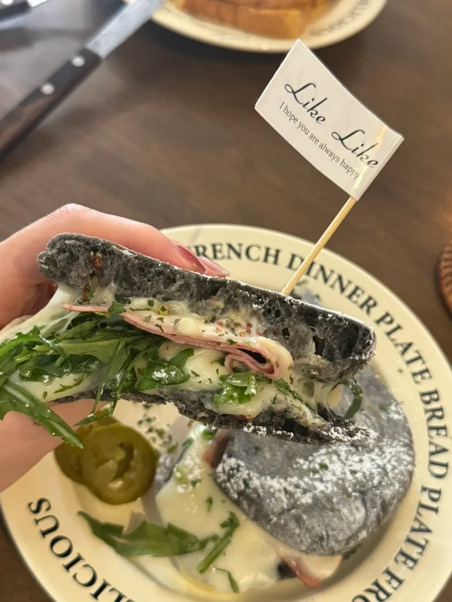 Cross-section of the panini with stretchy cheese