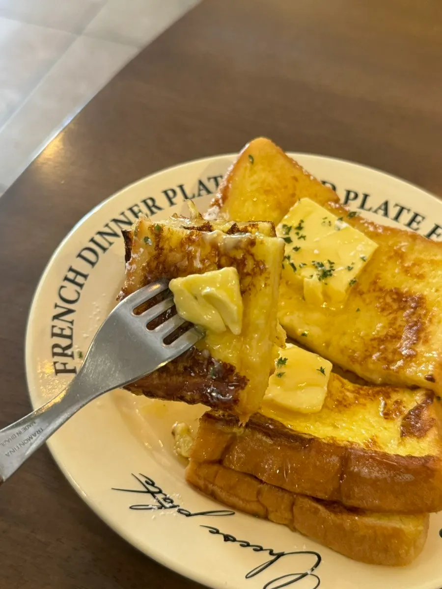 A piece of French toast topped with butter