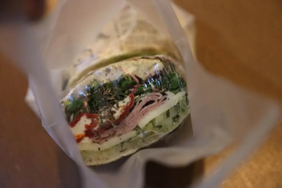 A generously sized piece of the sandwich