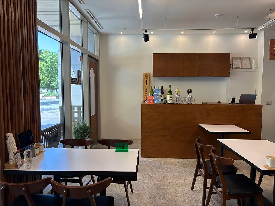 View toward the Lake Park from the full-height windows at Hwangje Sushi