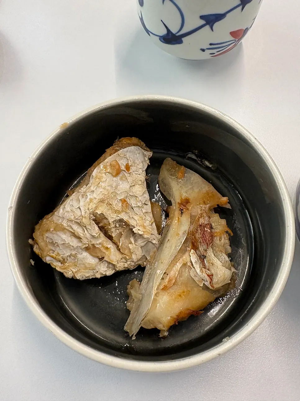 Complimentary abalone porridge and pickled vegetables