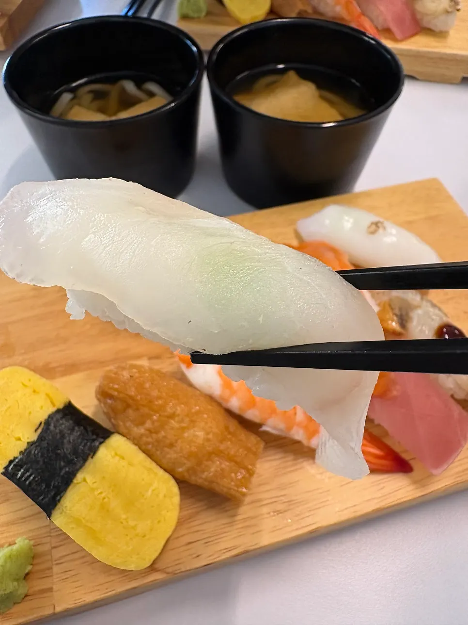 Salmon sushi with wasabi and soy sauce