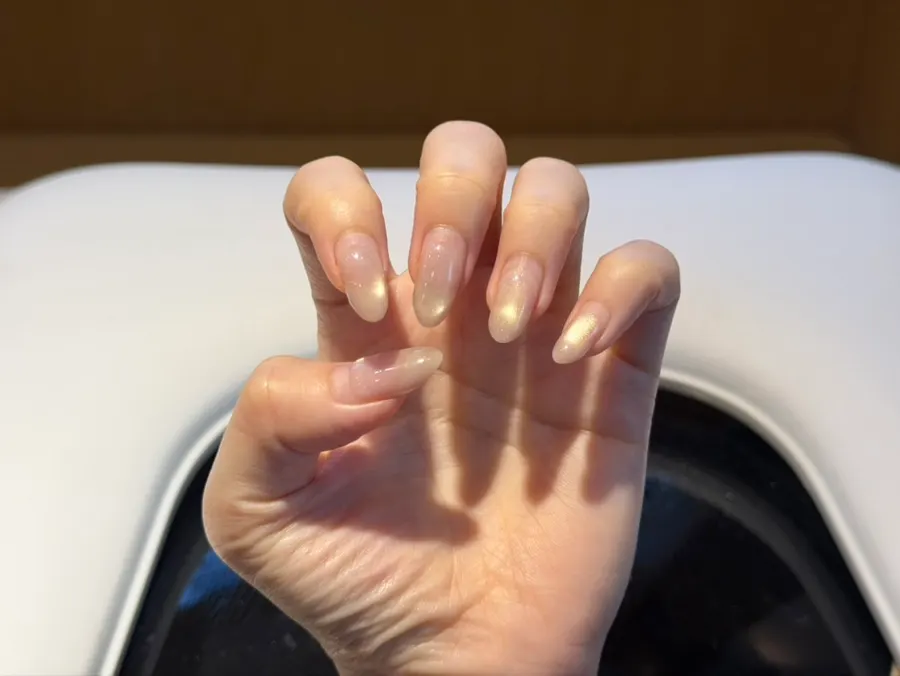 Nails before treatment with one-month-old gel nails