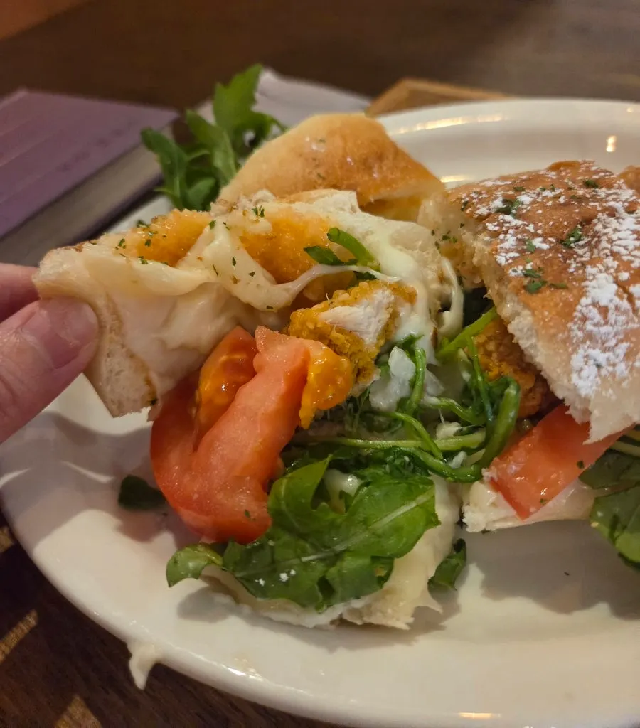 Panini filled with cheese and chicken tenders