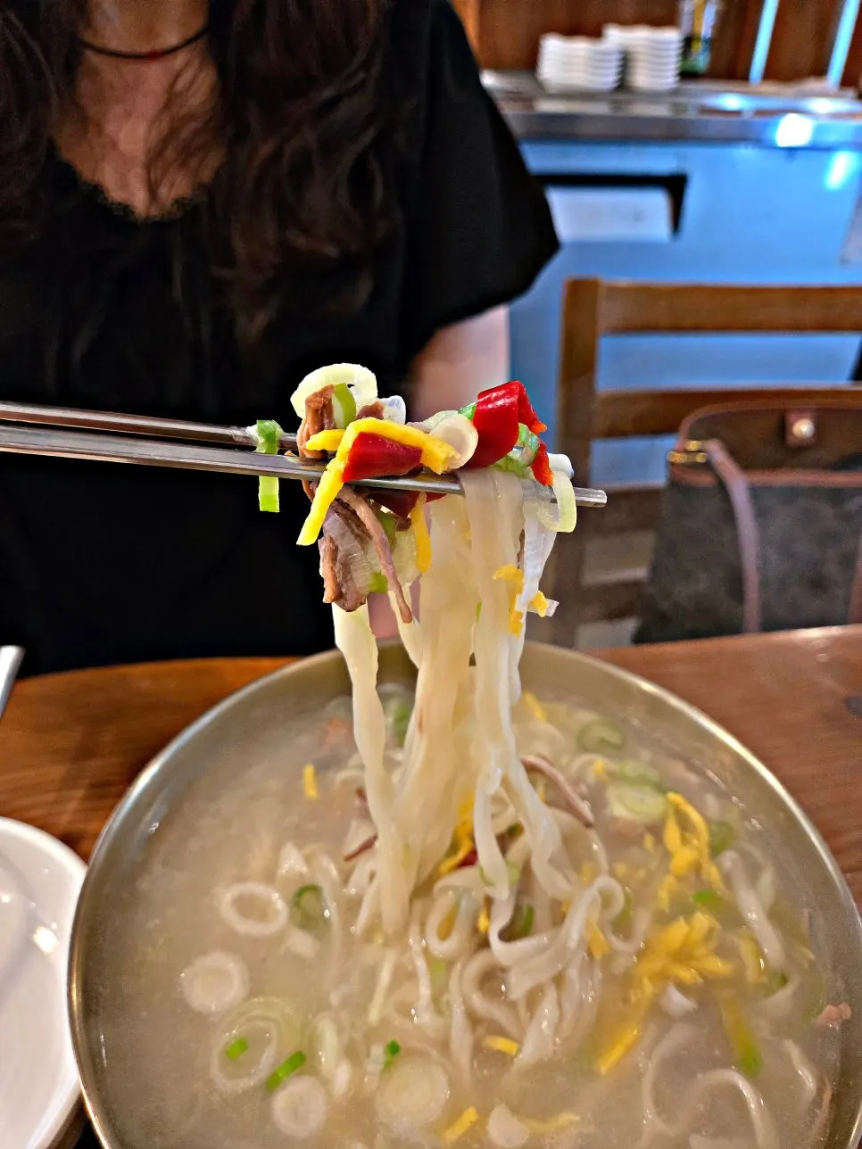 Beef brisket bibim kalguksu with perilla leaves