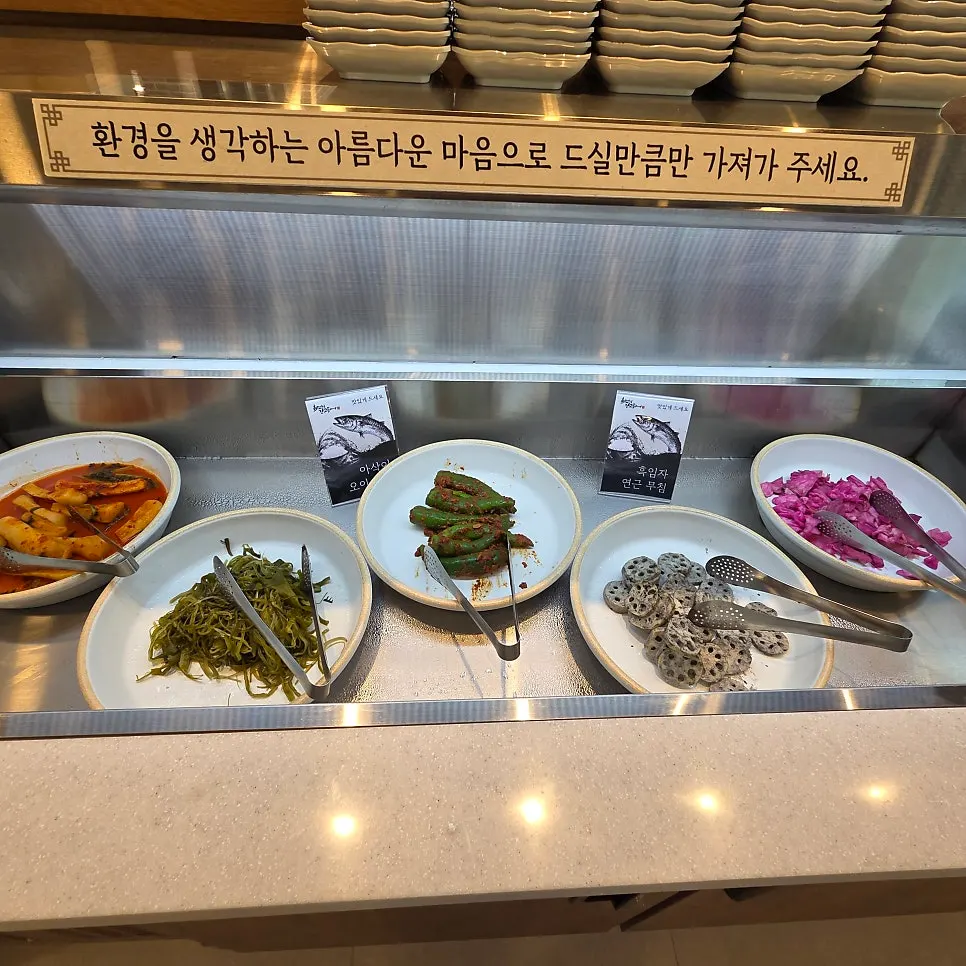 Various side dishes laid out at the self-serve bar