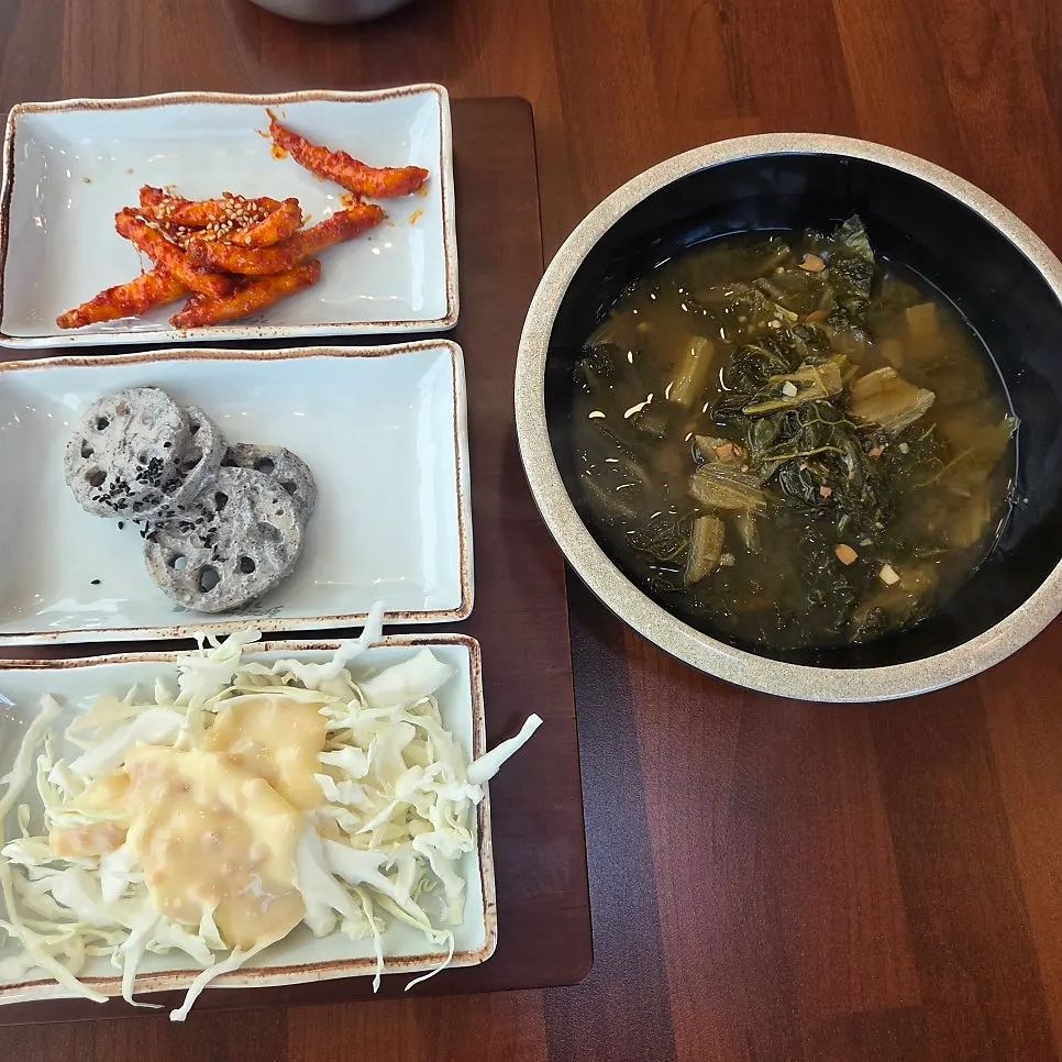 A plate of black sesame lotus root salad
