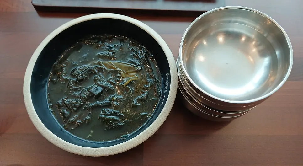 Japchae, grilled deodeok, lotus root salad and other banchan