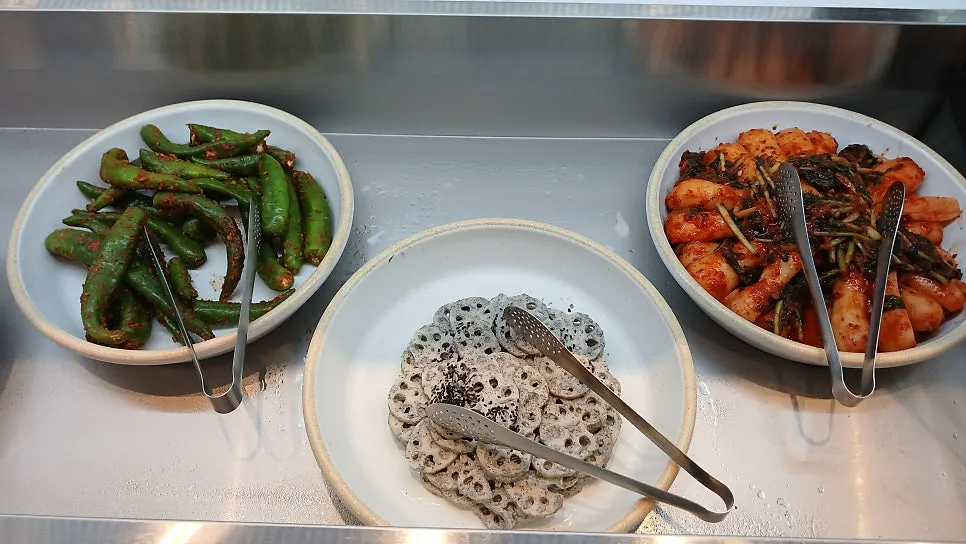Seasoned vegetable dishes at the salad bar