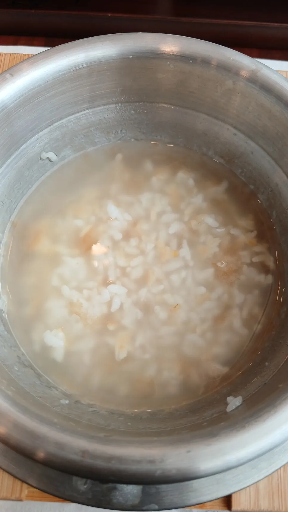 Fish flesh picked apart with chopsticks, served with rice