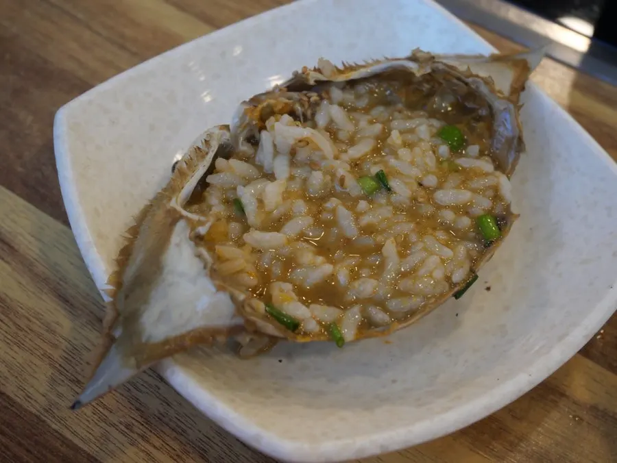 Soy crab eaten with rice